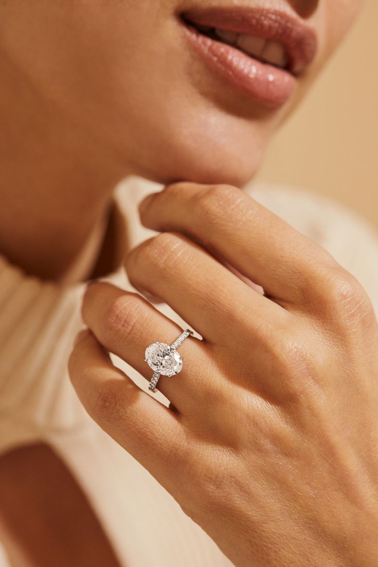 Oval diamond ring in a fashion editorial