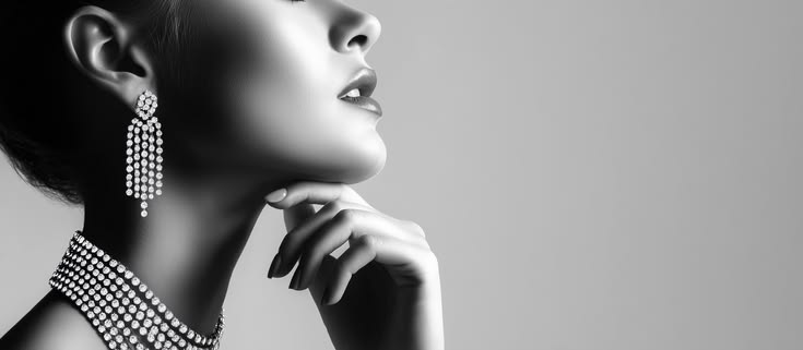Black and white portrait featuring diamond jewellery